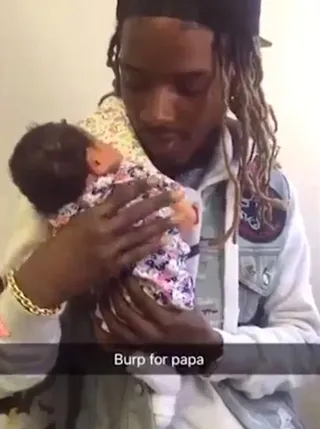Fetty Wap&nbsp;and&nbsp;Khari Barbie Maxwell - The "Trap Queen" rapper bonded with his newborn daughte on her mom, Masika Kalysha's, Snapchat. He had a proud papa moment when she said "Dada" for the first time! (Photo: Masika Kalysha via SnapChat)