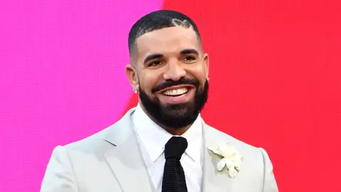 Drake, winner of the Artist of the Decade Award, speaks onstage for the 2021 Billboard Music Awards. 