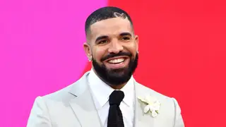 Drake, winner of the Artist of the Decade Award, speaks onstage for the 2021 Billboard Music Awards. 