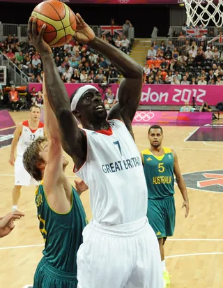 Hoop Dreams - Pops Mensah-Bonsu of Great Britain scores during the men's basketball preliminary round match between Great Britain and Australia.(Photo: Timothy A. Clary - IOPP Pool /Getty Images)