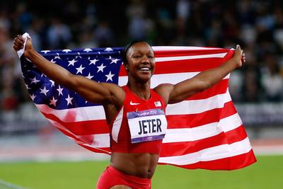 Carmelita Jeter: November 24 - With those abs, this three-time Olympic medalist makes 35 look incredible.(Photo: Jamie Squire/Getty Images)