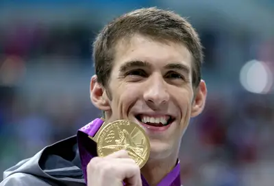 And Another One - Michael Phelps won yet another gold for the United States in the men's 200m individual medley final, becoming the first man to win the same individual event at three consecutive Olympic games. (Photo: Ezra Shaw/Getty Images)