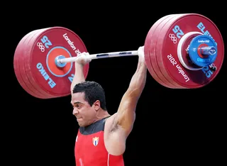 Bronze for Cuba's Rodriguez - Cuban weightlifter Ivan Cambar Rodriguez earned a bronze in the men's 77kg weightlifting competition. (Photo: Jeff Gross/Getty Images)