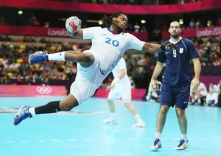 France Smacks Down the Competition  - Cedric Sorhaindo of France helped the team triumph in the Men's Handball Preliminary match between Argentina and France. (Photo: Jeff Gross/Getty Images)