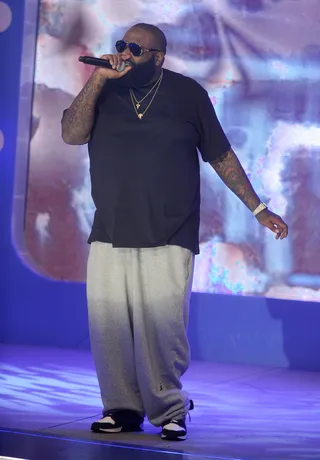 Rozay Hustles Hard - Rozay's debut album,&nbsp;Port of Miami,&nbsp;spawned the 2006 classic trap-anthem "Hustlin'" and put Miami rap back on the map. If it wasn’t obvious before the album hit No. 1 on the Billboard charts, it soon became clear that Rick Ross was about to hustle and grind to his way straight to the top.  (photo: John Ricard / BET)