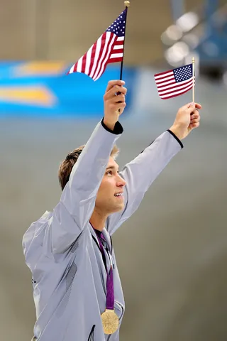Golden Boy - U.S. swimmer Matt Grevers celebrates with his gold medal during the medal ceremony for the men's 100m backstroke competition. (Photo: Clive Rose/Getty Images)