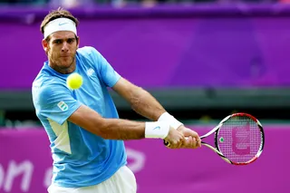 Expert Follow Through - Juan Martin Del Potro of Argentina attemps a backhand during the men's singles tennis match against Andreas Seppi of Italy. (Photo: Clive Brunskill/Getty Images)