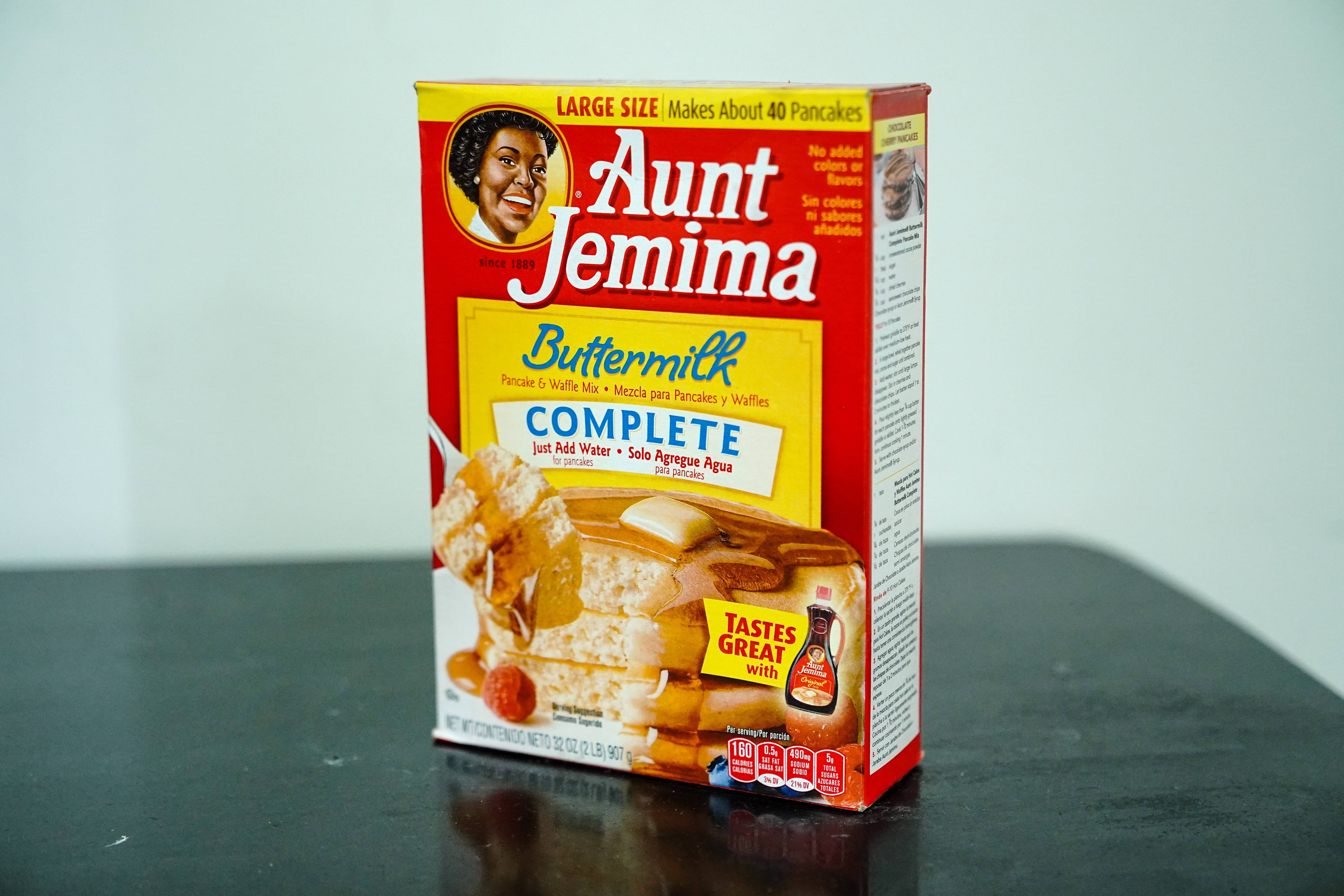 NEW YORK CITY, UNITED STATES - 2020/06/27: In this photo illustration an Aunt Jemima product seen on a table. The company is going to give its 130 year old Aunt Jemima brand a new look following complain saying that the logo is racist. The logo depict a black woman as a friendly servant. (Photo Illustration by John Nacion/SOPA Images/LightRocket via Getty Images)