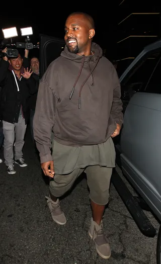 Big Brother - Kanye West is all smiles leaving his sister-in-law Kendall Jenner's 20th birthday celebration at the Nice Guy Club in West Hollywood.  (Photo: Photographer Group / Splash News)