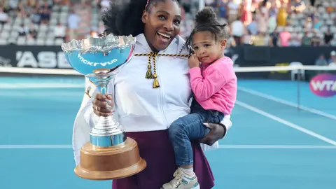 Serena Williams of the US with her daughter Alexis Olympia after her win against Jessica Pegula of the US during their women's singles final match during the Auckland Classic tennis tournament in Auckland on January 12, 2020. (Photo by MICHAEL BRADLEY / AFP) (Photo by MICHAEL BRADLEY/AFP via Getty Images)