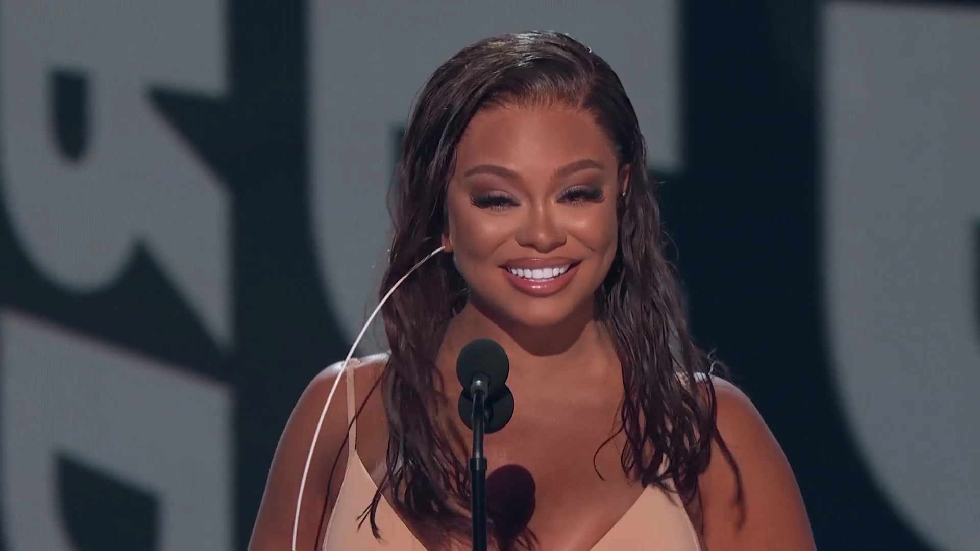 Latto accepts the award for Best New Artist at the BET Awards 2022.