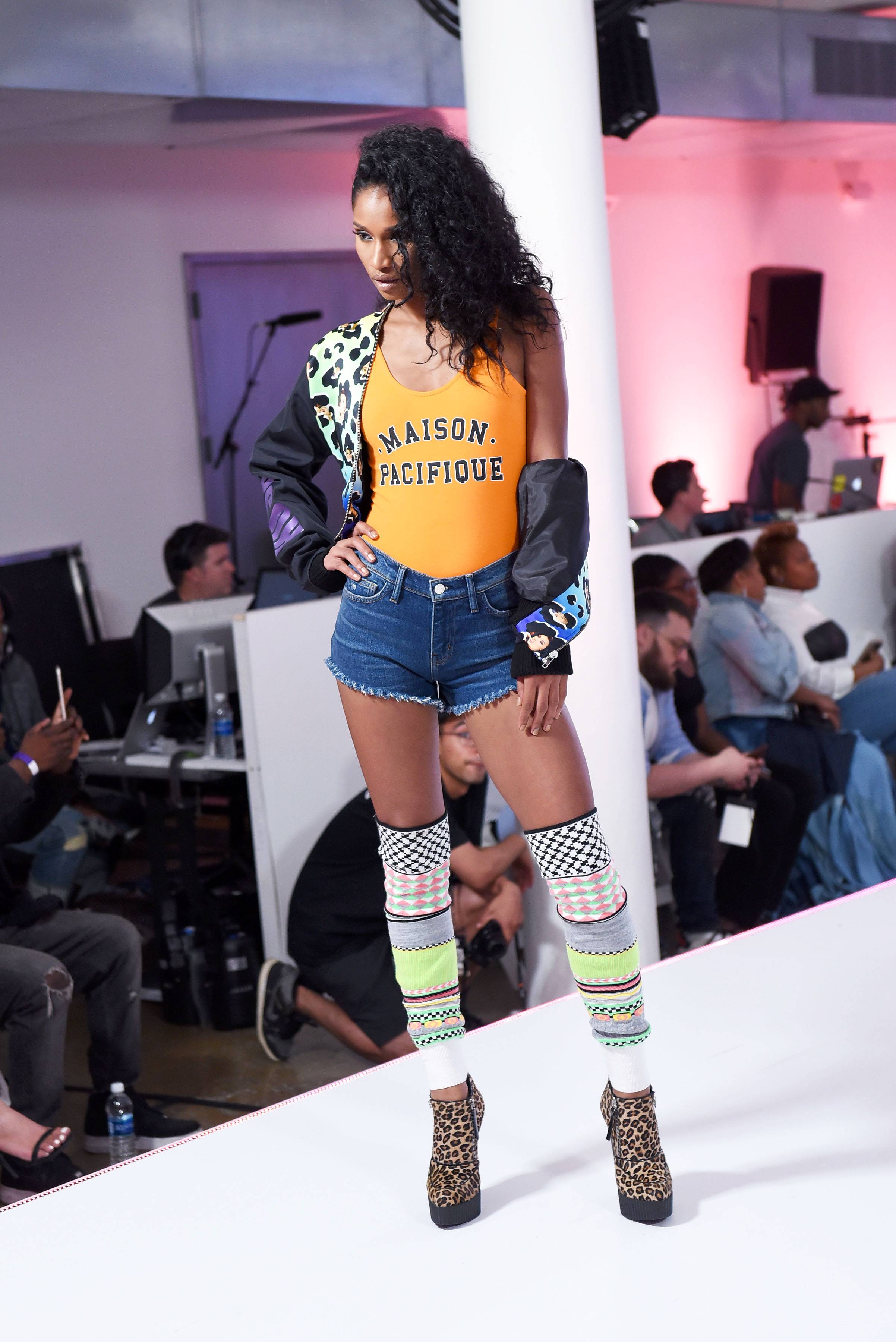 #TeamDenim - If there ever was a denim basketball team, model Renee Alway would be the point guard. She's gaining major points for rocking these L'agence shorts, Top Shop body suit, and  Leg Warmers Anz Booties by Diesel. (Photo: Noam Galai/Getty Images for BET Networks) &nbsp;&nbsp;