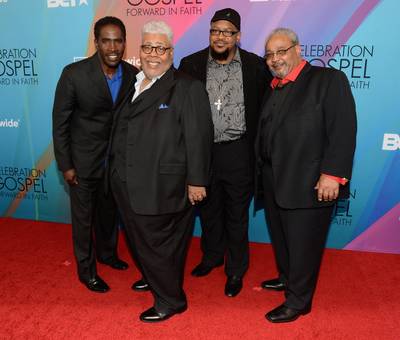 Old School&nbsp; - The Rance Allen Group kept everything traditional and fashionable in black suits with red, blue and stripes as complimentary patterns to their outfits. (Photo: Jason Kempin/Getty Images for BET)