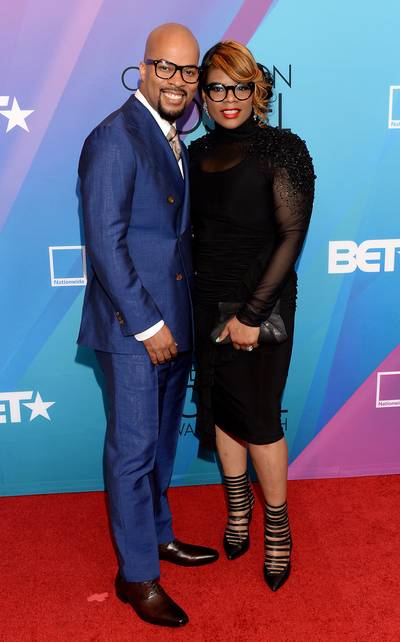 Lovely - JJ Hairston and his wife Tina Hairston arrived in style with matching specs and dripping perfection from head-to-toe. (Photo: Jason Kempin/Getty Images for BET)