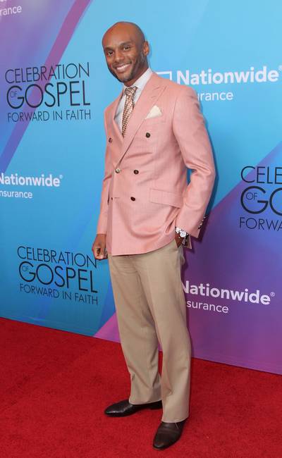 Spring Ready - In khaki slacks and a pastel pink blazer, Kenny Lattimore looked amazing and younger than ever upon his arrival to this year's Celebration of Gospel! (Photo: Maury Phillips/BET/Getty Images for BET)