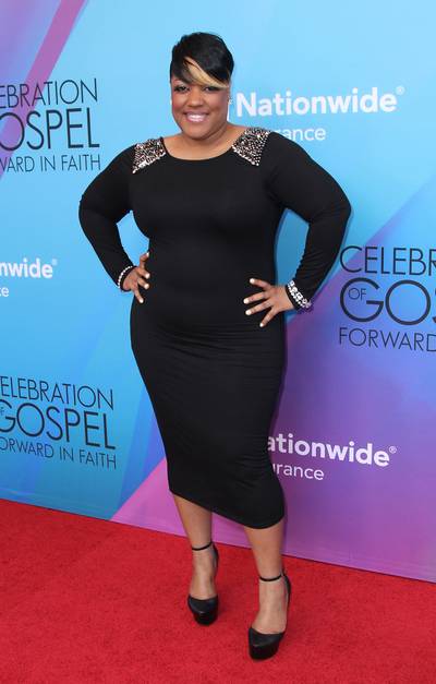 Perfection - Singer Anita Wilson wore all black everything with platform black leather pumps for height with embellishment on the shoulders and wrists to enhance her flawless look for the evening.(Photo: Maury Phillips/BET/Getty Images for BET)