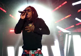 /content/dam/betcom/images/2014/03/Shows/106-and-park-03-11-03-20/031414-shows-106-park-lil-wayne-performs-sxsw.jpg