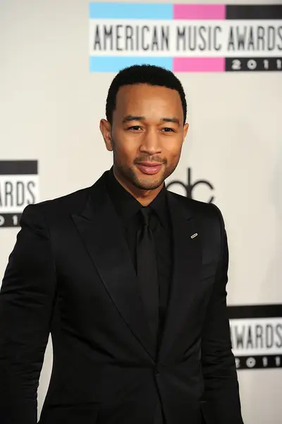 John Legend (@johnlegend)\r - TWEET: &quot;I wonder what skittles sales will be like this month. #Trayvon&quot; \r\rJohn Legend tweets about Trayvon Martin, the teenager who was shot and killed in Florida for looking suspicious, despite the fact that the only thing he was carrying on him was a cellphone and a bag of Skittles he just bought from the store.\r\r&nbsp;(Photo: Elevation/CFI/Picturegroup)