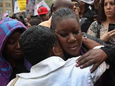 A Hug for a Grieving Mother - Sybrina Fulton hugs a supporter at the march.Under Florida's &quot;Stand Your Ground&quot; law, George Zimmerman has not been charged with a crime in the shooting.(Photo: John Moore/Getty Images)