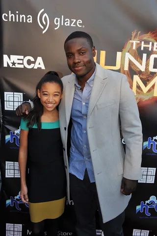 Amandla Stenberg and actor Dayo Okeniyi in The Hunger Games\r - For these two unknown actors, landing the roles of District 11 members Rue and Thresh, respectively, was better than winning the jackpot. As Entertainment Weekly predicted last year, &quot;the industry will watch two stars born right before their eyes.&quot; Now that THG has far surpassed even the greatest expectations, we'll have our eyes peeled for what these two young stars do next. &nbsp; (Photo: Moses Robinson/Getty Images)
