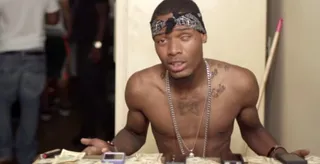 Fetty Wap - "Trap Queen" - Fetty Wap keeps it simple with this visit to his Paterson, New Jersey hometown. The video features all the trappings of hood royalty, complete with an apperance from his onscreen Queen, who, yes, bakes him a pie.