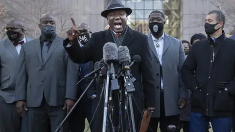 MINNEAPOLIS, MINNESOTA, USA - MARCH 29: Attorney Benjamin Crump (C) speaks during a morning press conference in front of the Hennepin County Government Center at the start of the trial of former officer Derek Chauvin over the killing of George Floyd in Minneapolis, United States on March 29, 2021. (Photo by Christopher Mark Juhn/Anadolu Agency via Getty Images)