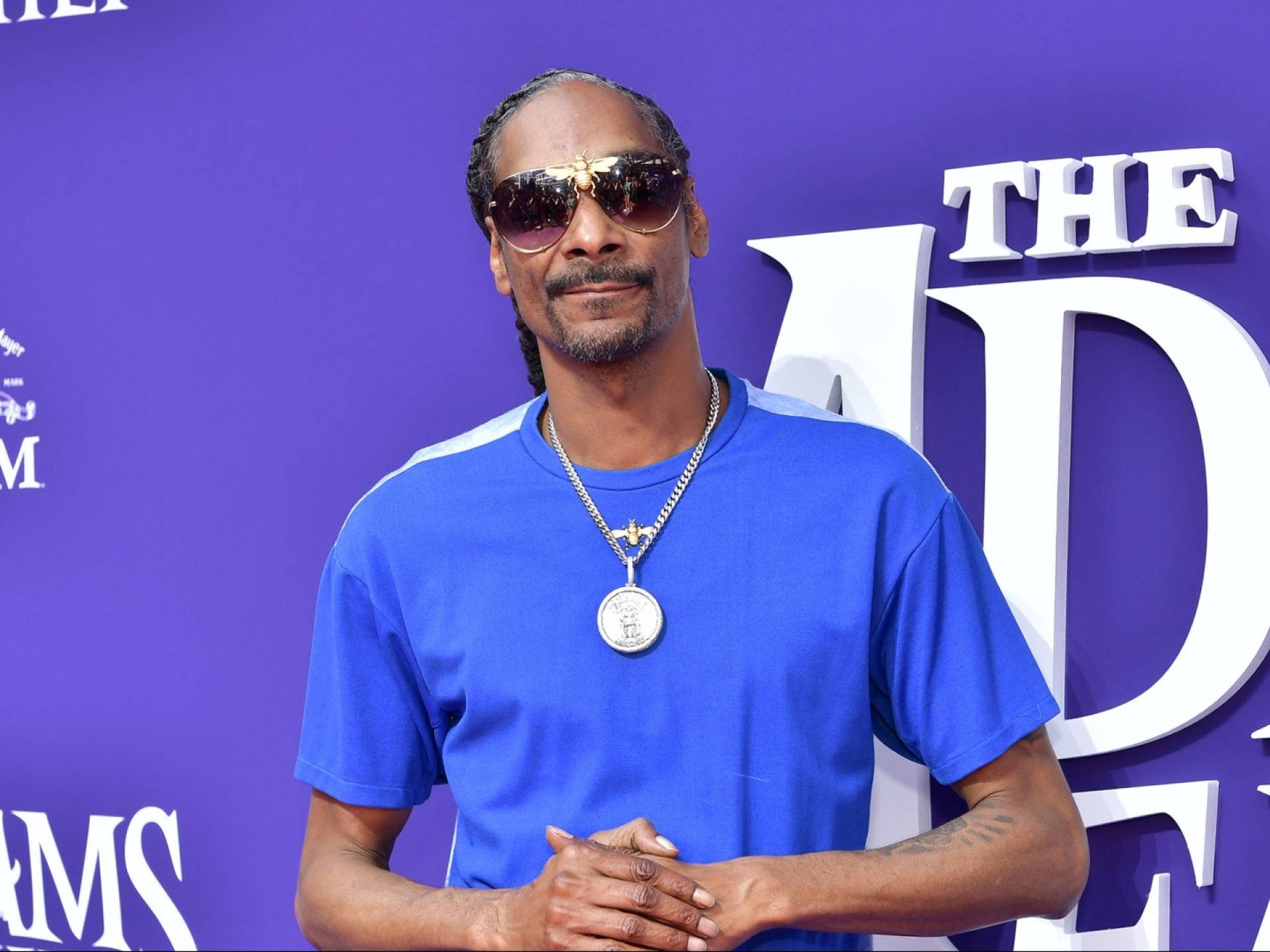 Snoop Dogg Recalls How Queen Elizabeth Stopped Him From Getting Kicked