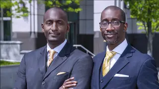 Dr. Randal Pinkett and Dr. Jeffrey Robinson, authors of Black Faces in White Places, pose in a picture looking towards the camera.