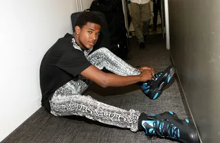 Staying Laced - Recording artist Trevor Jackson makes sure his shoes are laced backstage at 106. (Photo:&nbsp; Bennett Raglin/BET/Getty Images for BET)