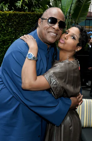 Music Legends - Singers Stevie Wonder and Toni Braxton share a hug at the ceremony honoring Kenny &quot;Babyface&quot; Edmonds with the 2508th Star on the Hollywood Walk of Fame. (Photo: Alberto E. Rodriguez/Getty Images)