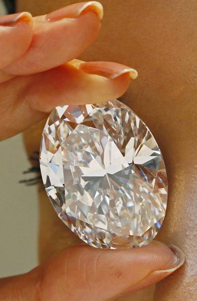 Now That's a Diamond - A white diamond the size of a small egg sold for $30.6 million at a Sotheby's auction in Hong Kong. Two bidders competed for the 118-carat diamond from Africa. (Photo: AP Photo/Vincent Yu, File)