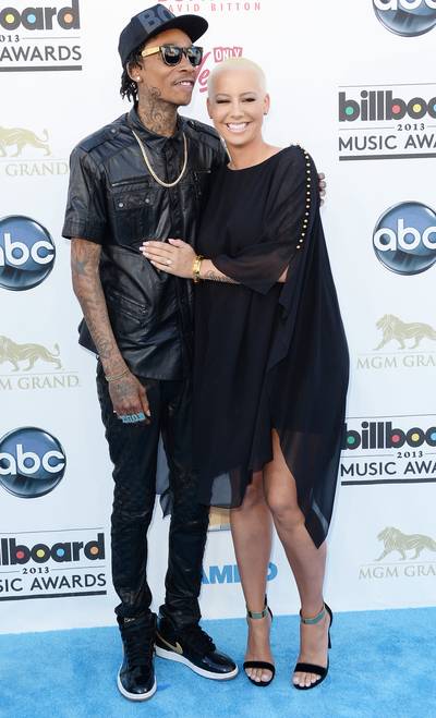 Wiz Khalifa and Amber Rose - Back in September 2014, Amber Rose filed for divorce from her then husband, rapper Wiz Khalifa, to the surprise of many. Rose, who was married to the &quot;Black and Yellow&quot; rapper for one year, subliminally revealed days following the filing that he was unfaithful during their marriage. They remain close friends to this day. &nbsp;(Photo: Jason Merritt/Getty Images)