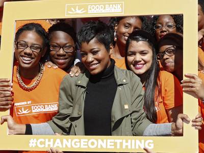 For the Future - Actress Keke Palmer poses with students from Opportunity High School in Harlem in front of the Change One Thing truck, which brings healthy recipes, snacks and prizes to teens in New York.(Photo: Brian Ach/Invision for FOOD BANK FOR NEW YORK CITY/AP Images)