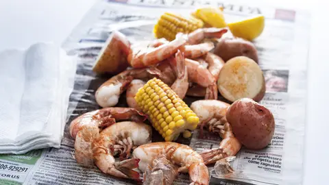 Seafood boil on newspaper