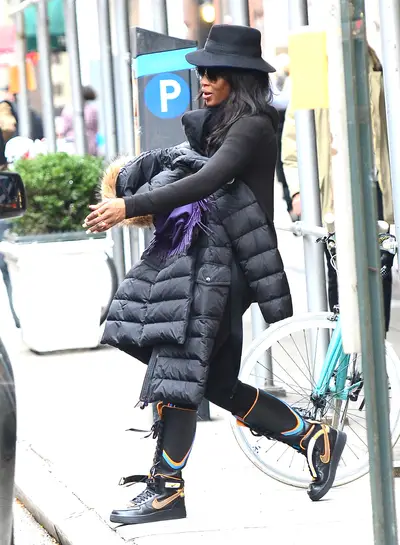 Cool Shoes - Naomi Campbell rocks a pair of interesting hi-top Nike sneakers and a black dress while in NYC.(Photo: JDH Imagez/Splash News)&nbsp;