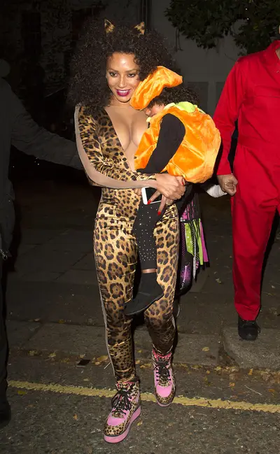 A Kitty and Her Pumpkin - Mel B&nbsp;shows off her MILF status as she carries her baby girl after leaving Jonathan Ross's Annual Halloween Party in her hometown of London.(Photo: Ringo, PacificCoastNews)