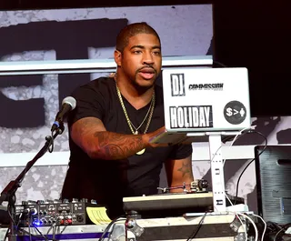 DJ Holiday  - DJ Holiday takes the stage as the house DJ. (Photo: Prince Williams/WireImage)