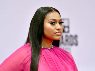 Jazmine Sullivan - Jazmine Sullivan styles in sleek and super straight hair. (Photo by Paras Griffin/Getty Images for BET)