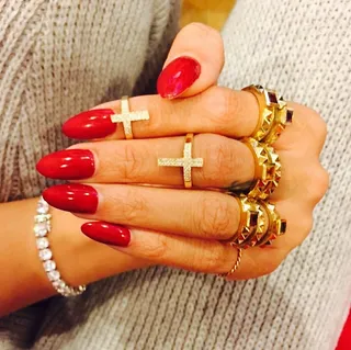 Rihanna - Nothing brings out gold bling like a sexy candy apple red polish. Rih adds further interest with sharp almond-shaped tips.  (Photo: Rihanna via Instagram)