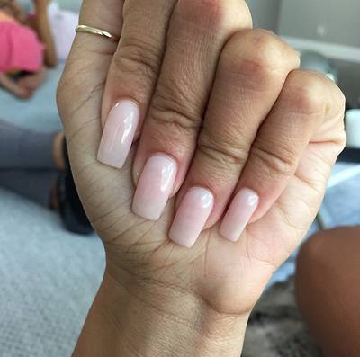 Draya Michele - One word: clean! Follow the reality star’s lead and opt for squared tips dressed with OPI’s Bubble Bath polish.  (Photo: Draya Michele via Instagram)