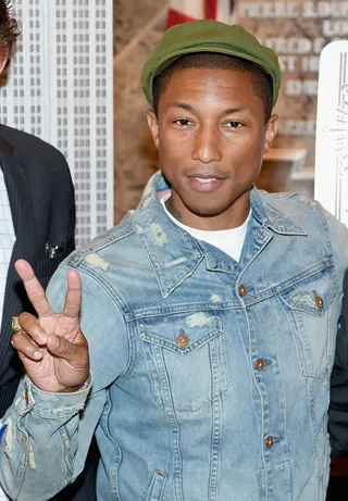 Pharrell Williams: April 5 - The 42-year-old &quot;Happy&quot; maestro has every reason to smile with all of his recent success.(Photo: Jamie McCarthy/Getty Images)