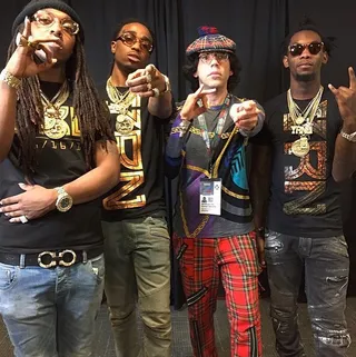 Migos, @migosatl - Atlanta rappers Migos pose with Canadian celebrity journalist Nardwuar the Human Serviette.&nbsp;(Photo: Migos via Instagram)