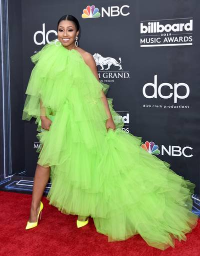 Yung Miami In Custom&nbsp;Oyemwen - Yung Miami had onlookers green with envy as she styled in a custom neon-green tulle dress by Oyemwen&nbsp;along with Christian Louboutin pumps.(Photo: Axelle/Bauer-Griffin/FilmMagic)