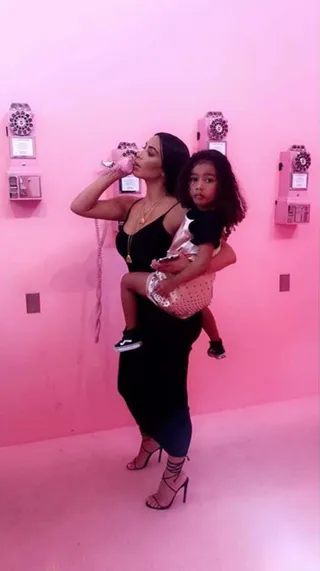 Fashion Pick-Me-Up - North had a mommy-and-me day with Kim Kardashian at the Museum of Ice Cream in NYC wearing a pink pastel silk dress.(Photo: Kourtney Kardashian via Snapchat)