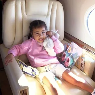 Fly Style - Northie got comfy for her flight to Costa Rica in a pink hoodie and white cut-offs.(Photo: Kim Kardashian via Snapchat)