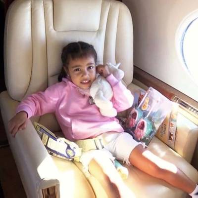 Fly Style - Northie got comfy for her flight to Costa Rica in a pink hoodie and white cut-offs.(Photo: Kim Kardashian via Snapchat)