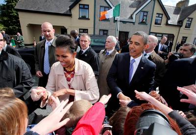 Dateline: Moneygall, May 23, 2011 - The Obamas greet the locals in the president's ancestral home of Moneygall, Ireland.   (Photo: Irish Government - Pool/Getty Images)