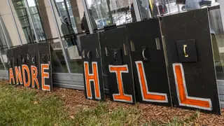 Signs spelling "Andre Hill" sit outside the Franklin County Common Pleas Courthouse after the arraignment of Adam Coy, the former Columbus Police officer who shot and killed Andre Hill, in Columbus, Ohio on February 5, 2021. - A former policeman has been charged with murder for the shooting death of an unarmed Black man in the US state of Ohio. The killing of Andre Hill shortly before Christmas in the city of Columbus sparked a new wave of protests in the United States against police brutality towards African Americans. (Photo by STEPHEN ZENNER / AFP) (Photo by STEPHEN ZENNER/AFP via Getty Images)