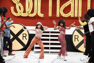 Bell bottoms come in handy when you're in the Soul Train line. - (Photo: Jace Downs/BET)