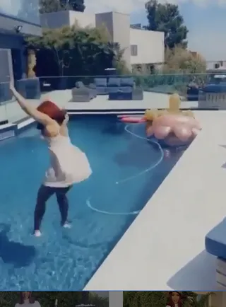 Swimming In Christian Louboutin's - Cardi B had a message for all the haters who tried to say that she's canceled. The Grammy-Award winning rapper took to Instagram to tell everyone that she 'Don't Give AF' about what people have to say about her or what she decides to post on her page. She wore a white slip and a pair of white Christian Louboutin pumps ($695) to give her message and at the end, jumped into the pool with everything on! Now that's how to tell the haters that you don't care!&nbsp; Cardi B